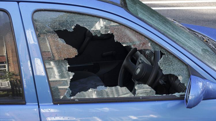 Car with window smashed.