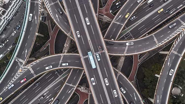 Aerial view of highway and overpass.